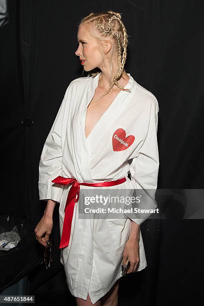 Model prepares backstage before the Desigual fashion show during Spring 2016 New York Fashion Week at The Arc, Skylight at Moynihan Station on...