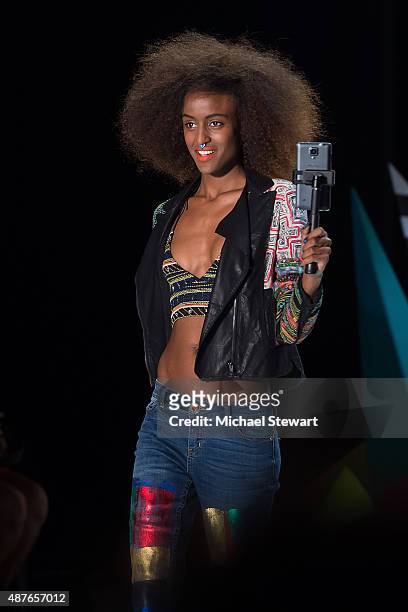 Model walks the runway during the Desigual fashion show during Spring 2016 New York Fashion Week at The Arc, Skylight at Moynihan Station on...