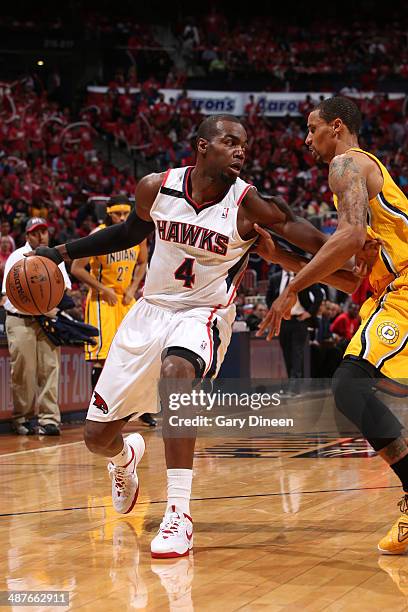 Paul Millsap of the Atlanta Hawks handles the ball against the Indiana Pacers during Game Six of the Eastern Conference Quarterfinals on May 1, 2014...