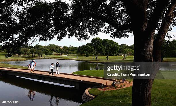 Suzann Pettersen of Norway and Cristie Kerr walk onto the eighth green during Round One of the North Texas LPGA Shootout Presented by JTBC at the Las...