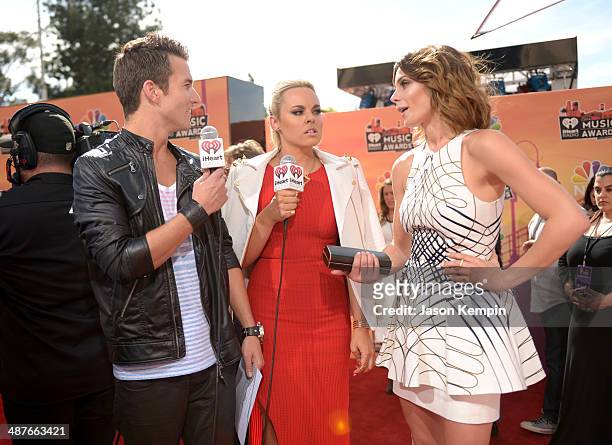 Radio personality Nathan Fast, singer Katy Tiz, and actress Ashley Greene attend the 2014 iHeartRadio Music Awards held at The Shrine Auditorium on...
