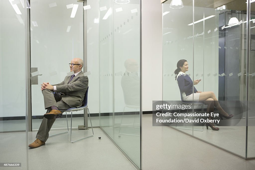 Business people sitting in conference rooms