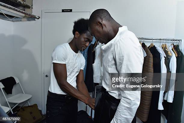 Designer Afriyie Poku prepares as AXE and Esquire present the AXE White Label Collective during the opening night of New York Fashion Week on...