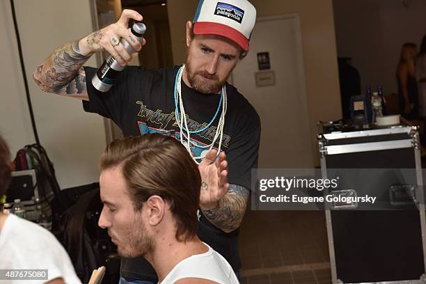 Model prepares backstage as AXE and Esquire present the AXE White Label Collective during the opening night of New York Fashion Week on September 10,...