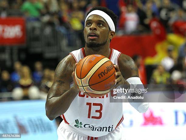 Ali Muhammed of Turkey vies for the ball during the FIBA EuroBasket 2015 Group B basketball match between Turkey vs Iceland at Mercedes Benz Arena in...