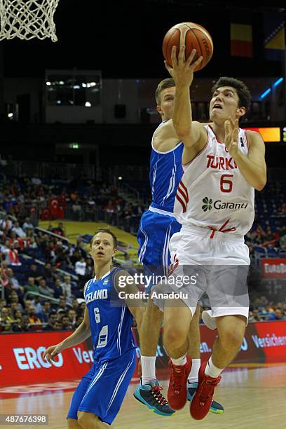 Cedi Osman of Turkey vies for the ball during the FIBA EuroBasket 2015 Group B basketball match between Turkey vs Iceland at Mercedes Benz Arena in...