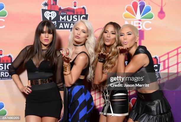 Natasha Slayton, Lauren Bennett, Emmalyn Estrada and Paula Van Oppen of G.R.L pose in the press room during the 2014 iHeartRadio Music Awards held at...
