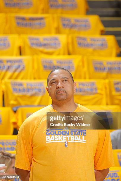 Head coach Mark Jackson of the Golden State Warriors watches his team warm up before facing the Los Angeles Clippers in Game Six of the Western...