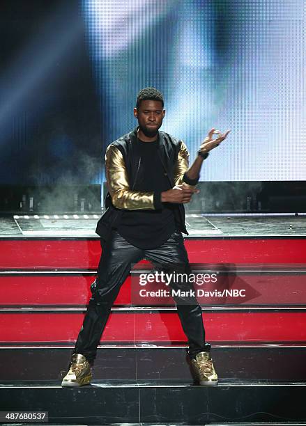 IHEARTRADIO MUSIC AWARDS -- Pictured: Singer Usher performs onstage during the iHeartRadio Music Awards held at the Shrine Auditorium on May 1, 2014.