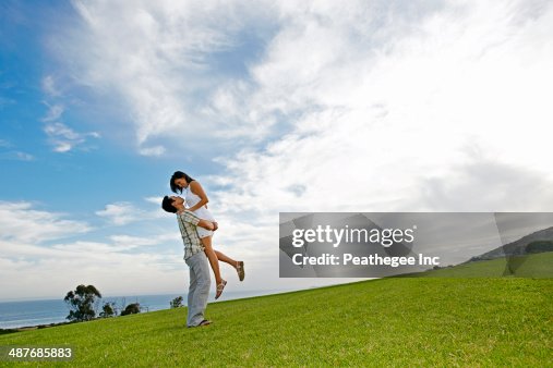 Couple hugging in rural landscape Couple hugging in rural landscape