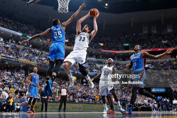 Marc Gasol of the Memphis Grizzlies drives to the basket against Kevin Durant of the Oklahoma City Thunder during Game Six of the Western Conference...