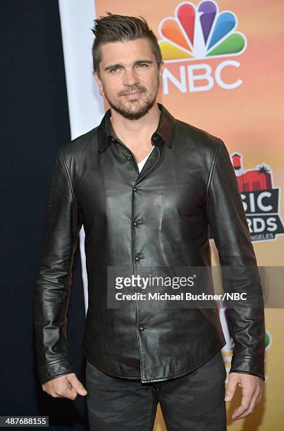 IHEARTRADIO MUSIC AWARDS -- Pictured: Recording artist Juanes poses in the press room at the iHeartRadio Music Awards held at the Shrine Auditorium...