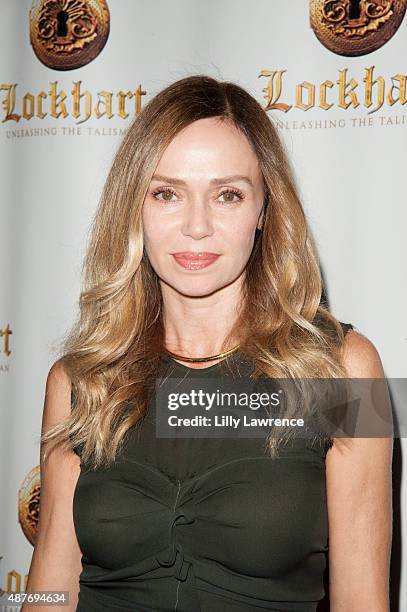 Actress Vanessa Angel arrives at the premiere Of "Lockhart" at Crest Theatre on September 10, 2015 in Westwood, California.