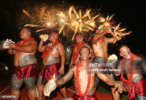 Samoan dancers perform as fireworks explode during the Closing Ceremony at the Apia Park Sports Complex on day five of the Samoa 2015 Commonwealth...