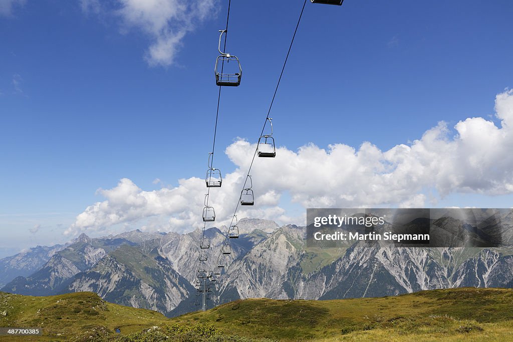 Obermooslift chairlift, Sonnenkopf skiing region, Lechquellen Mountains at the back, Verwall mountains, Vorarlberg, Austria