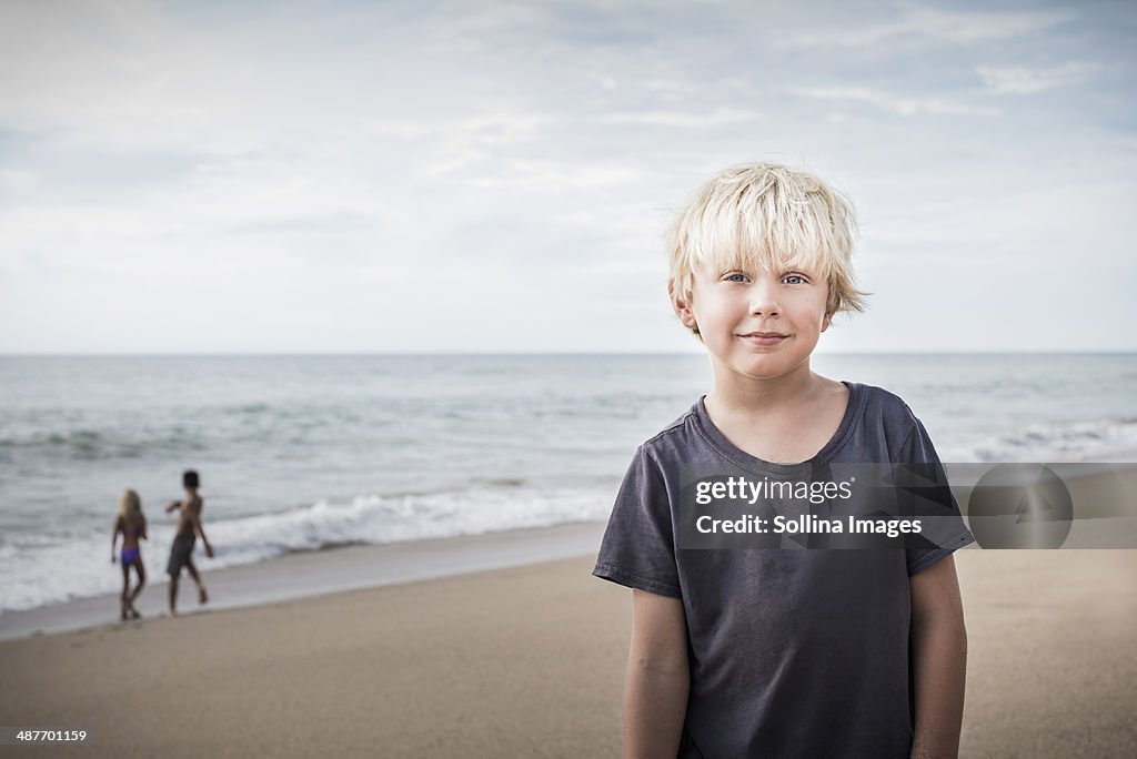 Boy smiling on beach
