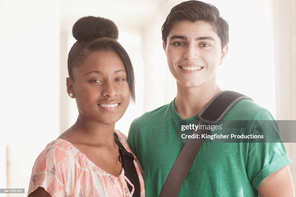 Teenage couple smiling together