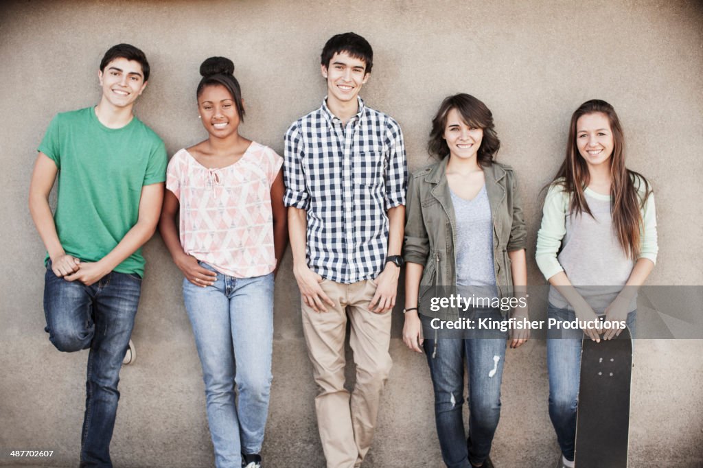Teenagers smiling together outdoors