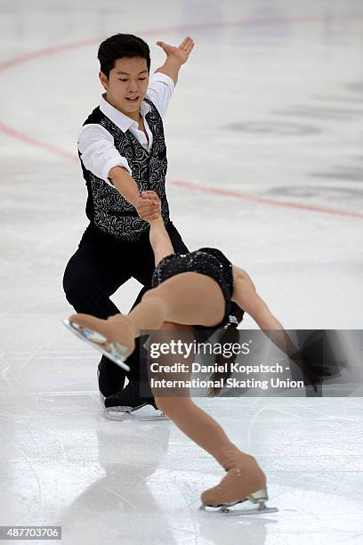 Ye Ri Kim and Alex Kang Chan Kam of Korea skate during junior pairs short programm of ISU Junior Grand Prix of figure skating on September 11, 2015...