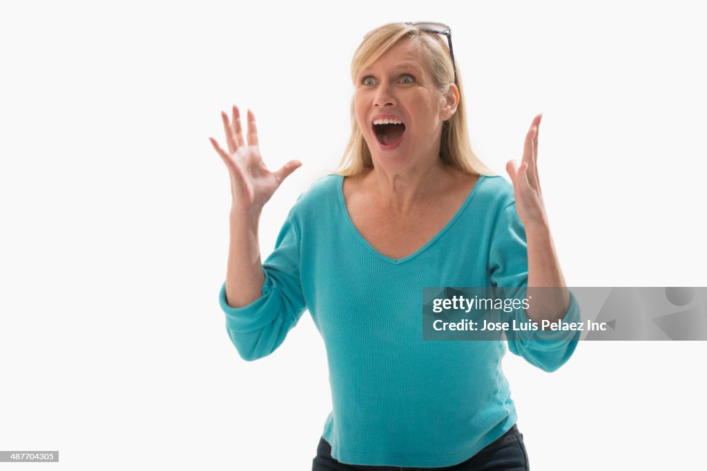 Caucasian woman cheering