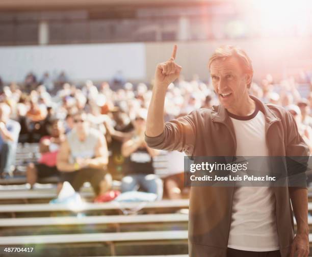 Cheering Finger 800 Sports Fan Finger Stock Photos, High-Res Pictures, and Images ...