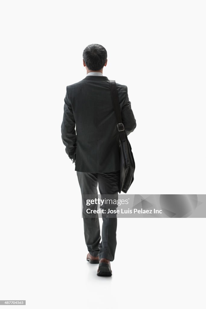 Chinese businessman walking