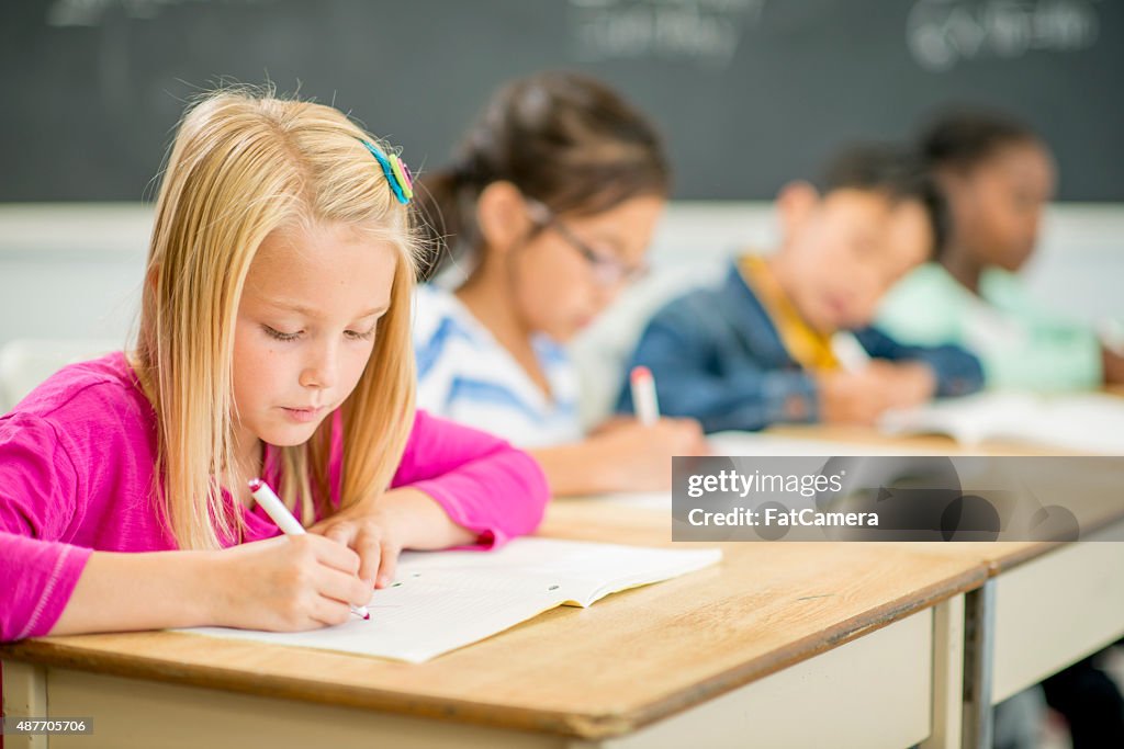 Children Coloring on Paper