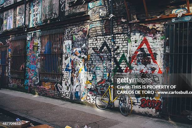bricklane fixie bike - london graffiti stock pictures, royalty-free photos & images