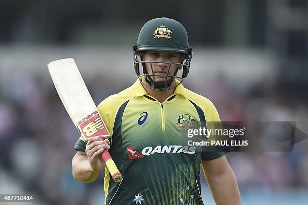 Australia's Aaron Finch leaves the field after being caught out by England's Jonny Bairstow off the bowling of David Willey for 15 runs during the...