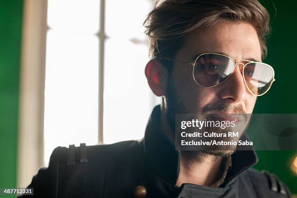 young man with sunglasses - aviator glasses fotografías e imágenes de stock