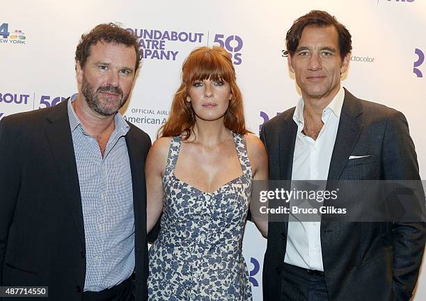 Director Douglas Hodge, Kelly Reilly and Clive Owen pose at the Roundabout Theater Company's 50th Anniversary Season Party at The American Airlines...