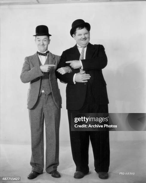 Promotional shot of comedy double act Stan Laurel and Oliver Hardy, 1932.