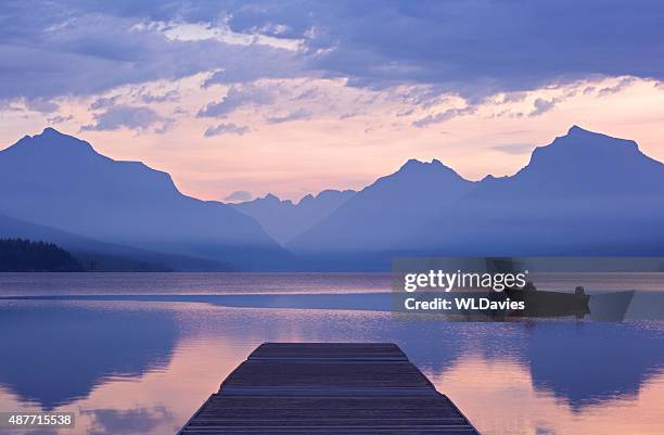 tranquil dawn - bergsteiger stockfoto's en -beelden