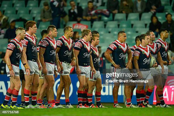 Roosters players show their dejection during the NRL qualifying final match between the Sydney Roosters and the Melbourne Storm at Allianz Stadium on...