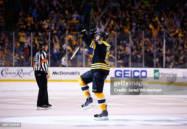 Johnny Boychuk of the Boston Bruins celebrates his goal in the third period against the Montreal Canadiens to force overtime in Game One of the...