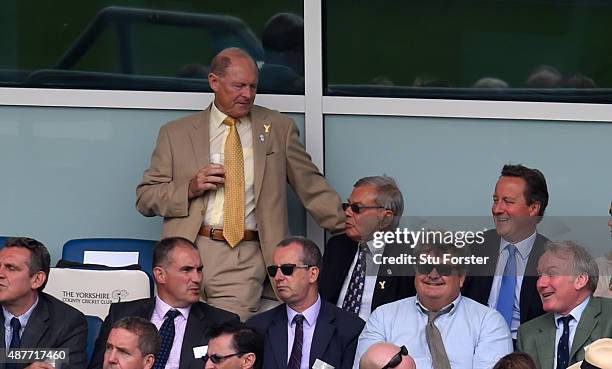 Former Yorkshire legend Geoffrey Boycott chats with Yorkshire CC president Harold 'Dickie' Bird as Prime Minister David Cameron raises a smile during...