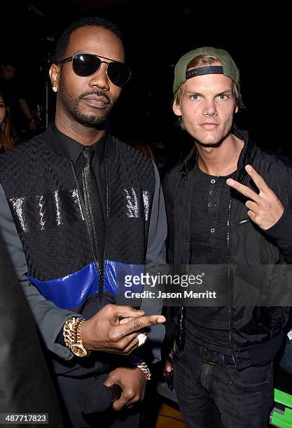 Rapper Juicy J and DJ Avicii backstage at the 2014 iHeartRadio Music Awards held at The Shrine Auditorium on May 1, 2014 in Los Angeles, California....