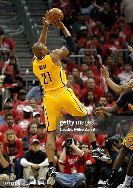 Forward David West of the Indiana Pacers shoots a fade away jumper in Game 6 of the Eastern Conference Quarterfinals against the Atlanta Hawks during...