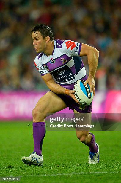 Cooper Cronk of the Storm looks to pass the ball during the NRL qualifying final match between the Sydney Roosters and the Melbourne Storm at Allianz...