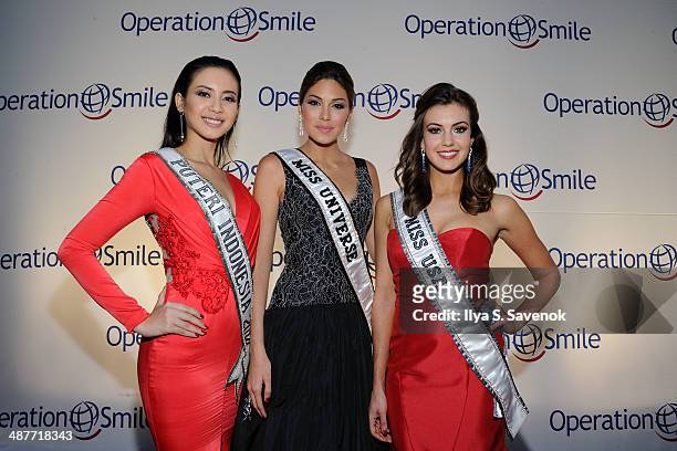 Elvira Devinamira, Gabriela Isler and Erin Brady attend Operation Smile's Smile Event at Cipriani Wall Street on May 1, 2014 in New York City.