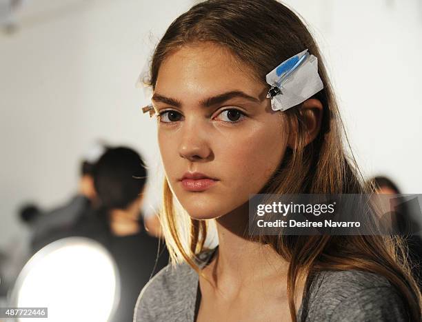 Model prepares backstage during the House of Gant Presentation Spring 2016 New York Fashion Week on September 10, 2015 in New York City.