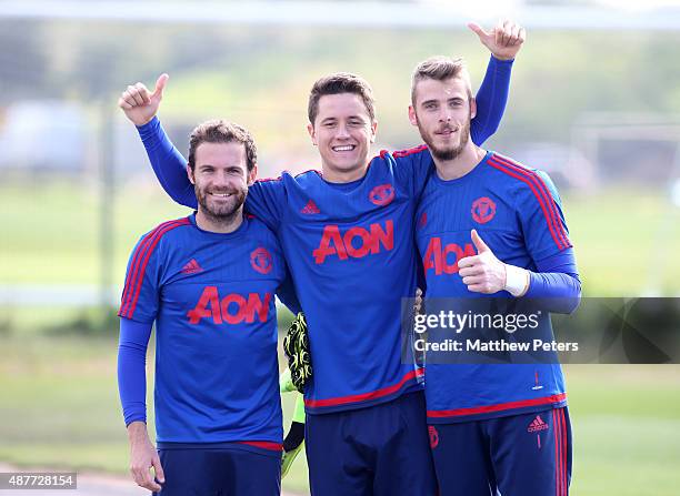 Juan Mata, Ander Herrera and David de Gea of Manchester United in action during a first team training session at Aon Training Complex on September...