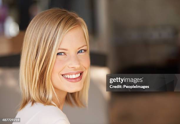 confidence gives her that special something! - female blonde blue eyes stock pictures, royalty-free photos & images
