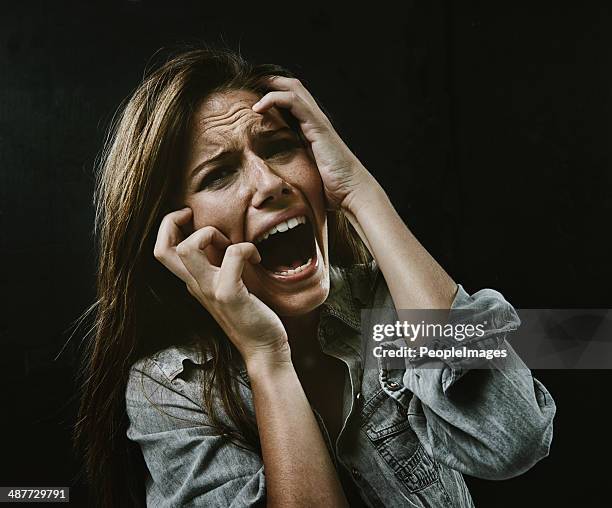 the face of desperation - female torture stock pictures, royalty-free photos & images