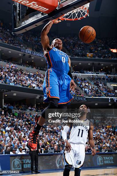 Russell Westbrook of the Oklahoma City Thunder dunks the ball ahead of Mike Conley of the Memphis Grizzlies during Game Six of the Western Conference...