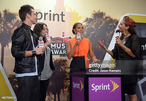 Radio personalities Nathan Fast and Jenn Marino, singer Mel B, and radio personality Nessa backstage at the 2014 iHeartRadio Music Awards held at The...