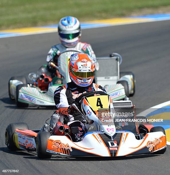 France's Jeremy Iglesias competes head Italy's Marco Ardigo in a free practice session of the CIK-FIA World Championship, on September 10 at Le Mans'...