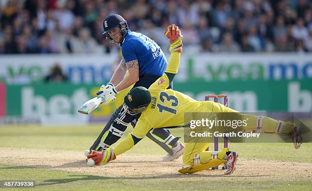 Ben Stokes of England hits the ball past Matthew Wade of Australia during the 4th Royal London One-Day International match between England and...