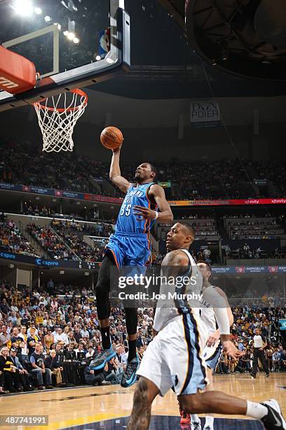 Kevin Durant of the Oklahoma City Thunder goes up for the dunk against the Memphis Grizzlies in Game Six of the Western Conference Quarterfinals...