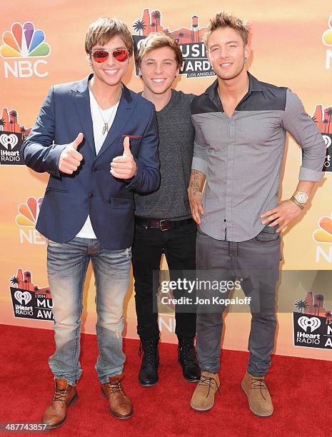 Singers Keaton Stromberg, Wesley Stromberg and Drew Chadwick of Emblem3 arrive at the 2014 iHeartRadio Music Awards at The Shrine Auditorium on May...